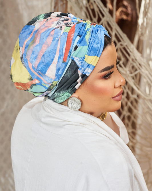 Splash turban with external tulle volume